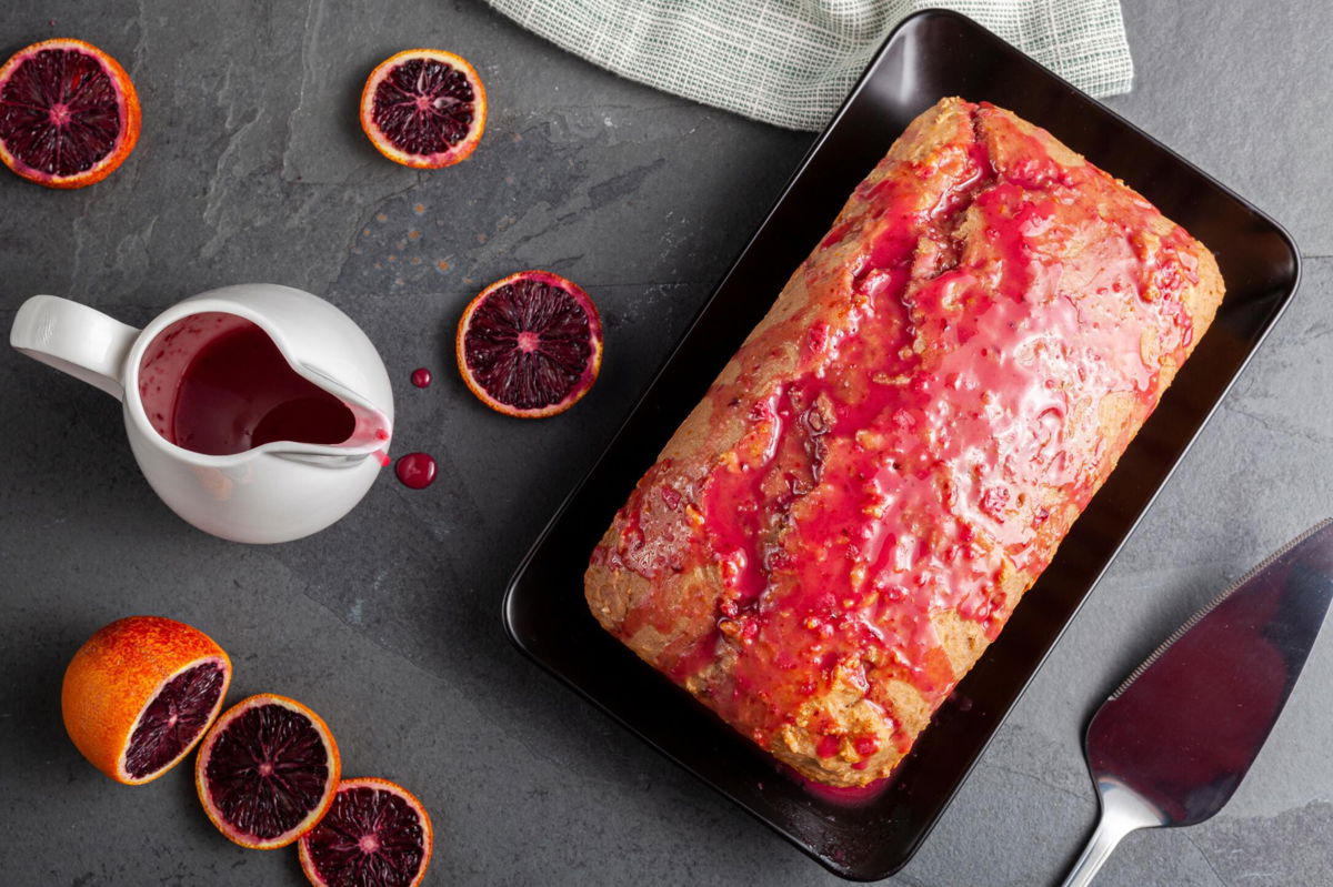 <i>Adobe Stock</i><br/>Brighten a loaf cake by finishing it with a blood orange glaze.