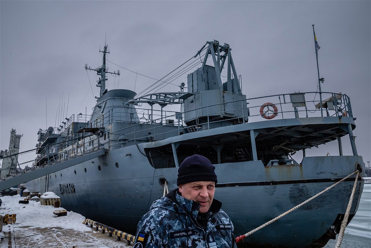 <i>Timothy Fadek/Redux for CNN</i><br/>Ukrainian Navy Capt. Oleksandr Hrigorevskiy stands on the dock of Mariupol's port with his ship