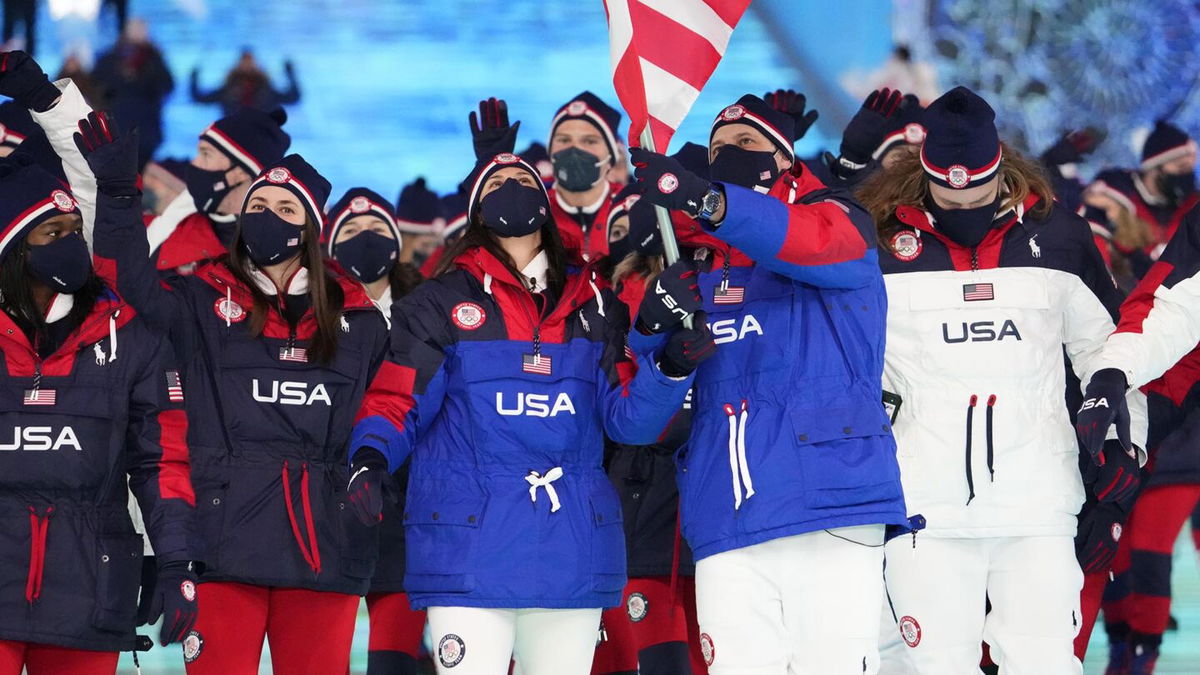 Team USA marches into National Stadium during Opening Ceremony