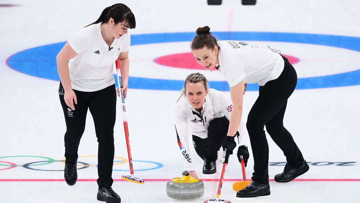 Great Britain team throws the stone