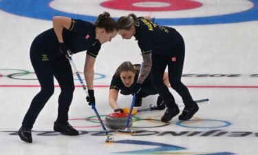 Swedish women's curlers sweep in front of curling stone