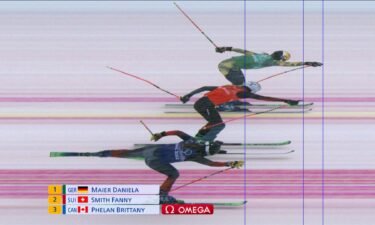Technical photo from above angle looking at three-way photo finish in ski cross
