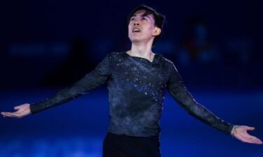 Vincent Zhou with arms wide open