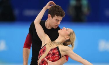 Knierim and Frazier pose together during their routine
