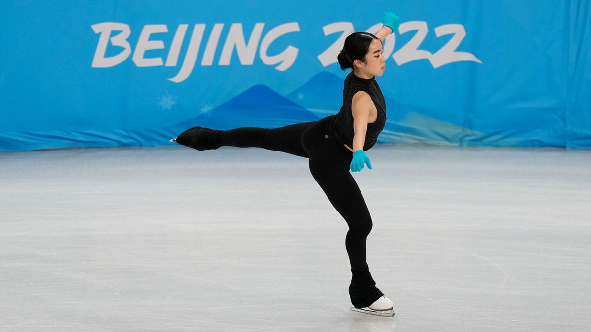 Karen Chen skates in front of Beijing 2022 sign