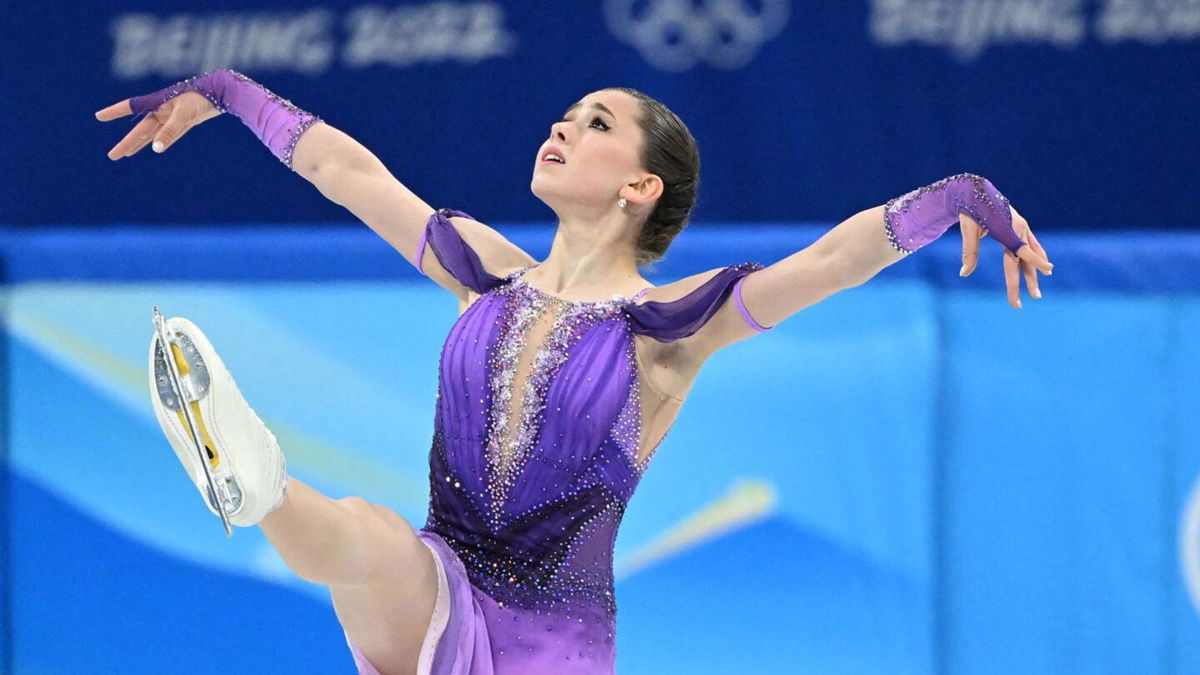 Valieva poses during her routine