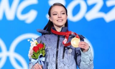 Shcherbakova holds up her medal