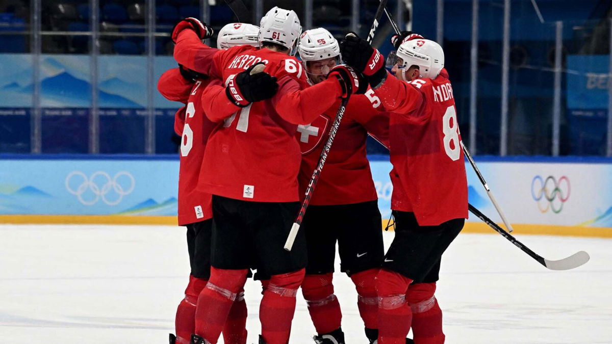 Switzerland beats Czechs to advance to hockey quarterfinals