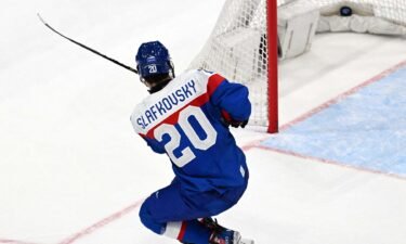Juraj Slafkovsky swings hockey stick
