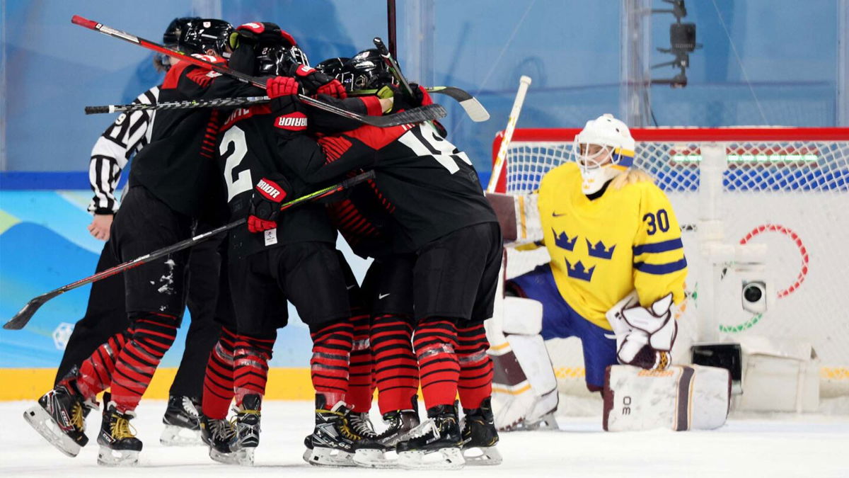 Japan celebrates a goal against Sweden during a Group B preliminary game.