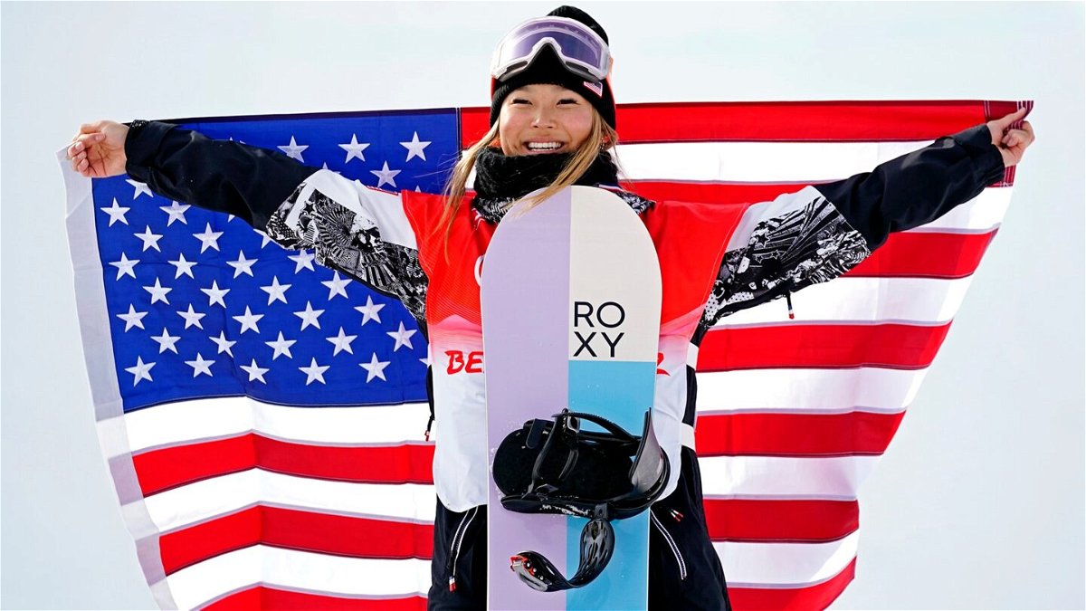 Chloe Kim celebrates after competing in the 2022 Winter Olympics