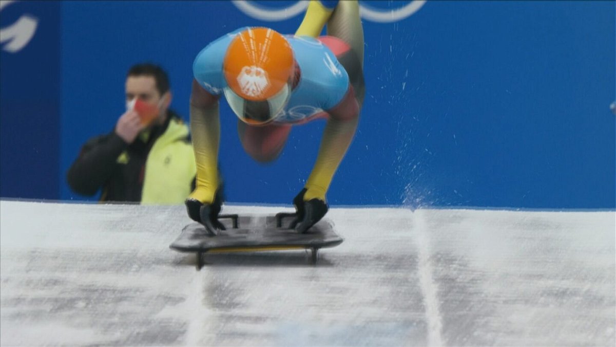 Unbeatable Moments: Sliding Olympic athletes fly down course