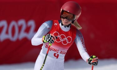 Mikaela Shiffrin reacts to her performance in the downhill portion of the women's combined event at the 2022 Winter Olympics.