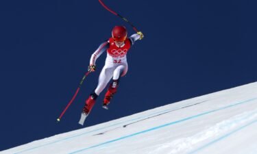 Mikaela Shiffrin competes in the women's downhill at the 2022 Winter Olympics.