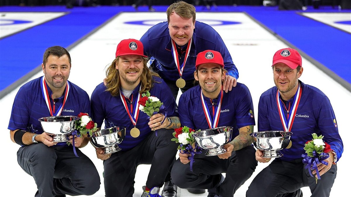 Team Shuster poses with medals