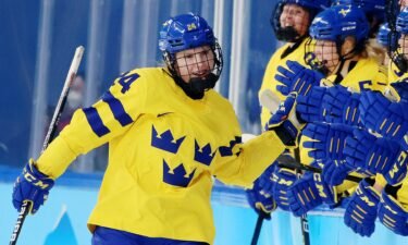 Sweden celebrates a goal at the 2022 Winter Olympics.