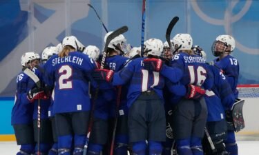 United States of America celebrate after the women's ice hockey quarterfinal of the Beijing 2022 Olympic Winter Games against Czech Republic.