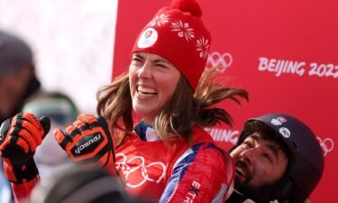 Gold medalist Petra Vlhova of Slovakia celebrates following the women's slalom at the 2022 Winter Olympics.