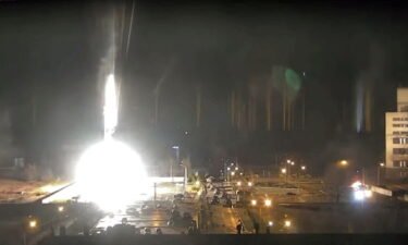 Surveillance camera footage shows a flare landing at the Zaporizhzhia nuclear power plant during shelling in Enerhodar
