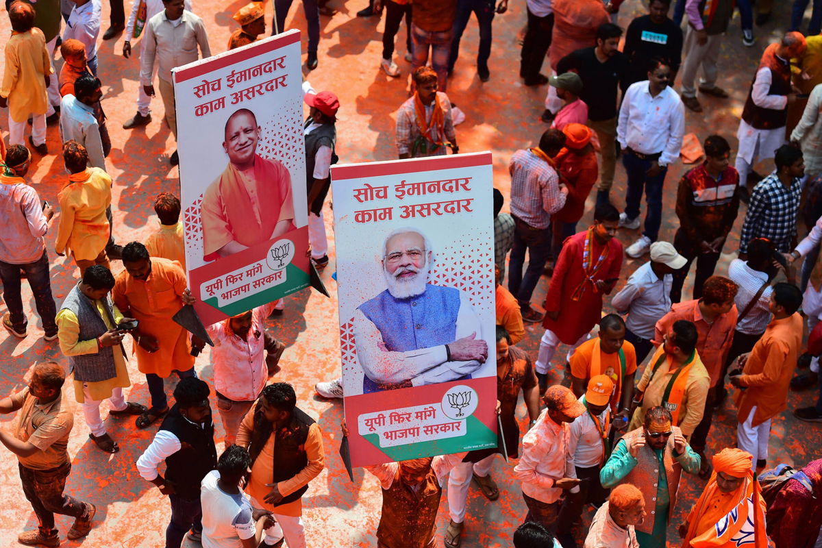 <i>Sanjay Kanojia/AFP/Getty Images</i><br/>India's ruling party soars to election victory in country's most populous state. Supporters of India's Bharatiya Janata Party (BJP) celebrate outside the party office in Lucknow on March 10.