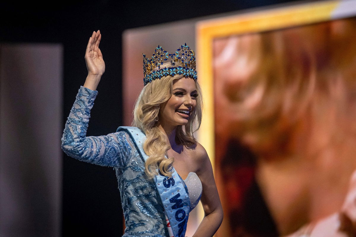 <i>Ricardo Arduengo/AFP/Getty Images</i><br/>Miss Poland Karolina Bielawska waves after winning the 70th Miss World beauty pageant. The ceremony featured messages of support for Ukraine following Russia's invasion of the country