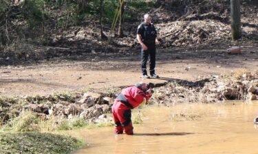 Three bodies were found March 24 in a submerged vehicle