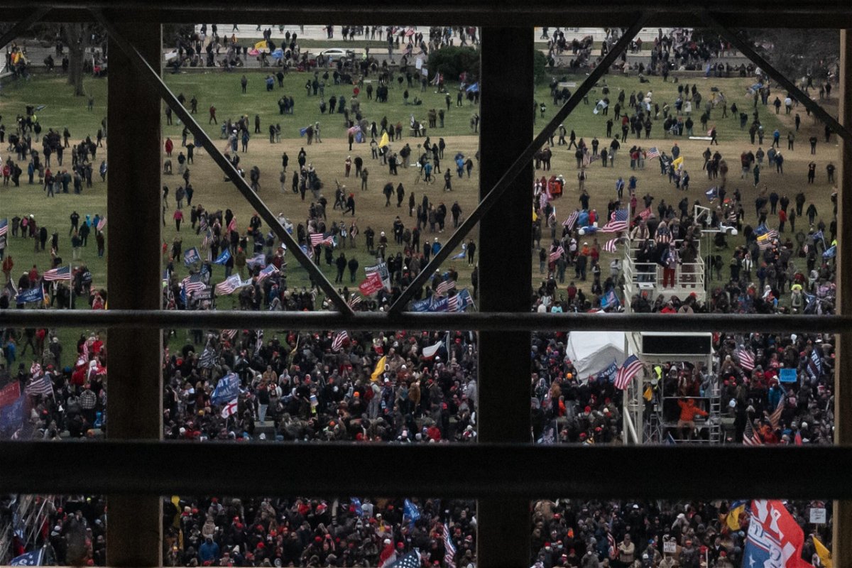 <i>Cheriss May/Getty Images</i><br/>A crowd of Trump supporters gather outside as seen from inside the US Capitol on January 6