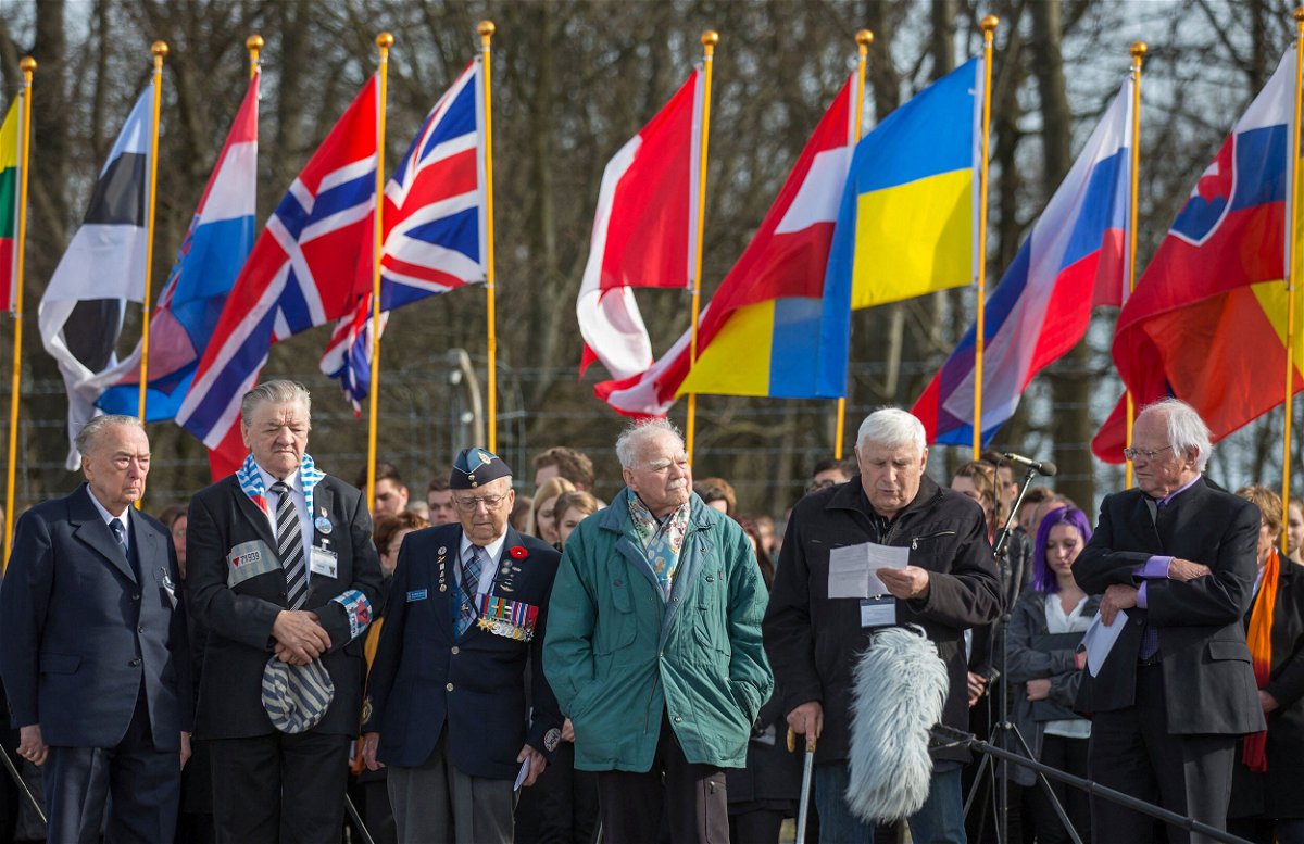 <i>Michael Reichel/Buchenwald and Mittelbau-Dora Me/AFP/Getty Images</i><br/>Borys Romanchenko (second right) pictured at the Buchenwald memorial site in 2015. Romanchenko