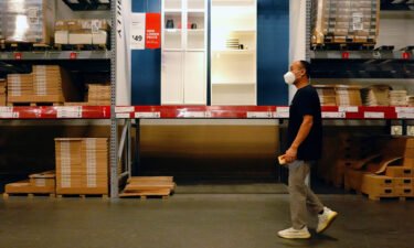 A person walks past an empty product spot in an Ikea store in New York City in 2021. The Swedish company said on March 31 it is