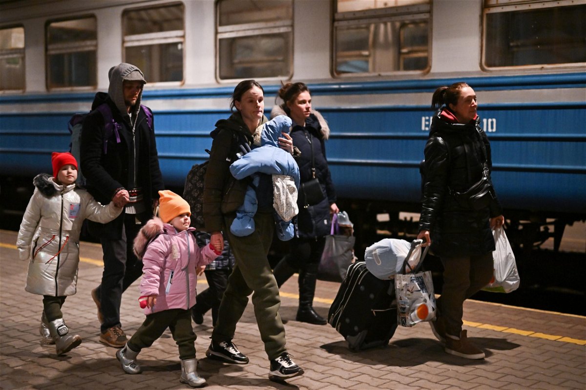 <i>Jeff J Mitchell/Getty Images</i><br/>People arrive at Przemysl train station in Poland from Ukraine on March 20. At least 10 million people have been forced to flee their homes in Ukraine following Russia's invasion less than a month ago