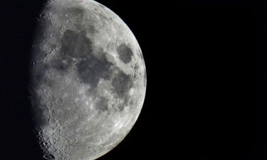 Impact craters cover the surface of the moon as it's seen over Berlin on January 11.