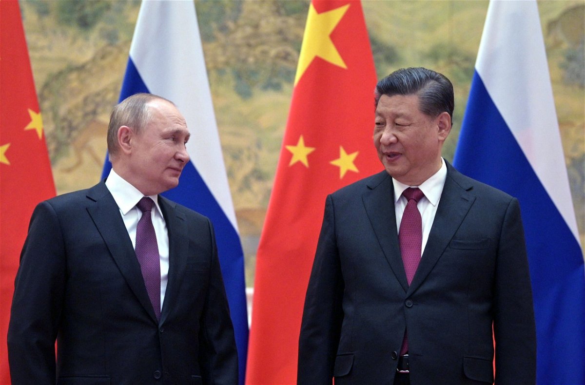 <i>Alexei Druzhinin/Sputnik/AFP/Getty Images</i><br/>Russian President Vladimir Putin (L) and Chinese President Xi Jinping pose for a photograph during their meeting in Beijing