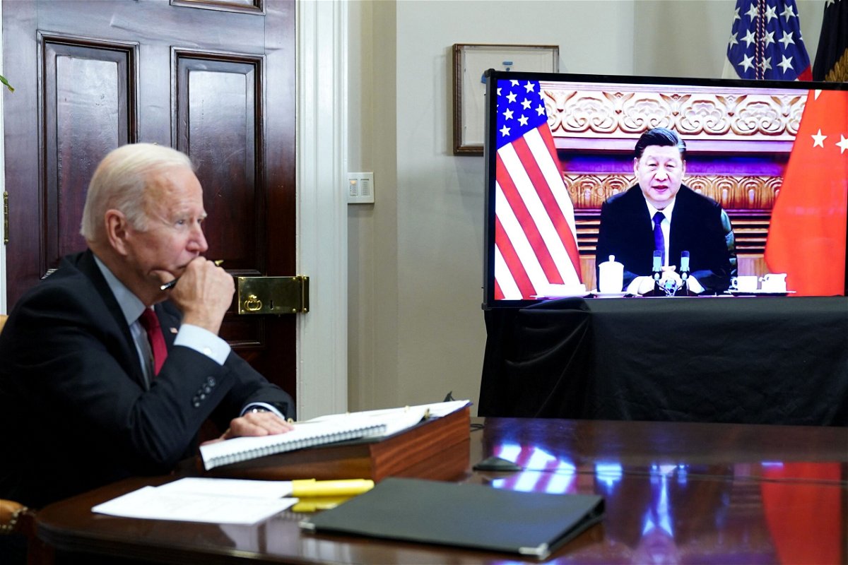 <i>Mandel Ngan/AFP/Getty Images</i><br/>US President Joe Biden meets with China's President Xi Jinping during a virtual summit from the Roosevelt Room of the White House in Washington