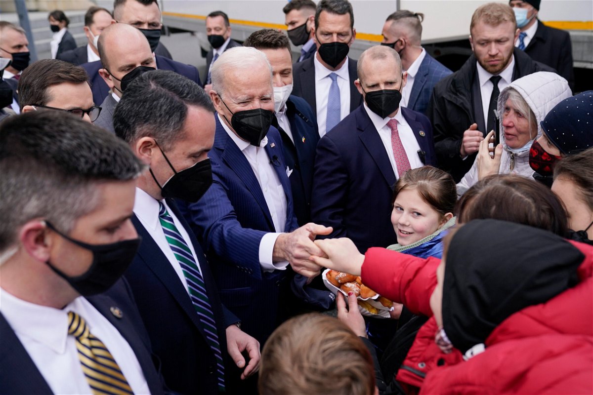 <i>Evan Vucci/AP</i><br/>President Joe Biden meets with Ukrainian refugees and humanitarian aid workers during a visit to PGE Narodowy Stadium