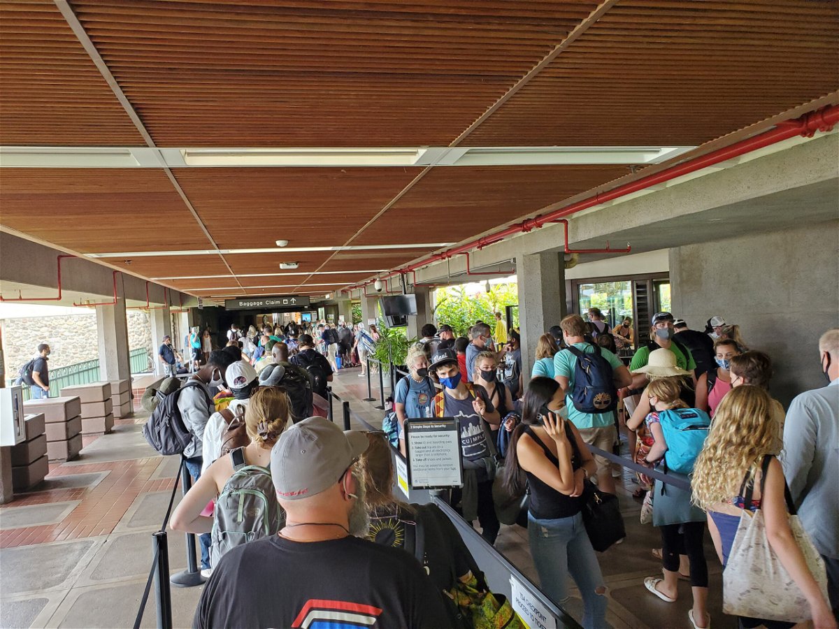 <i>Gado/Getty Images</i><br/>Long security lines are visible at Kahului Airport as passengers wait for departing flights from the island of Maui on August 5.