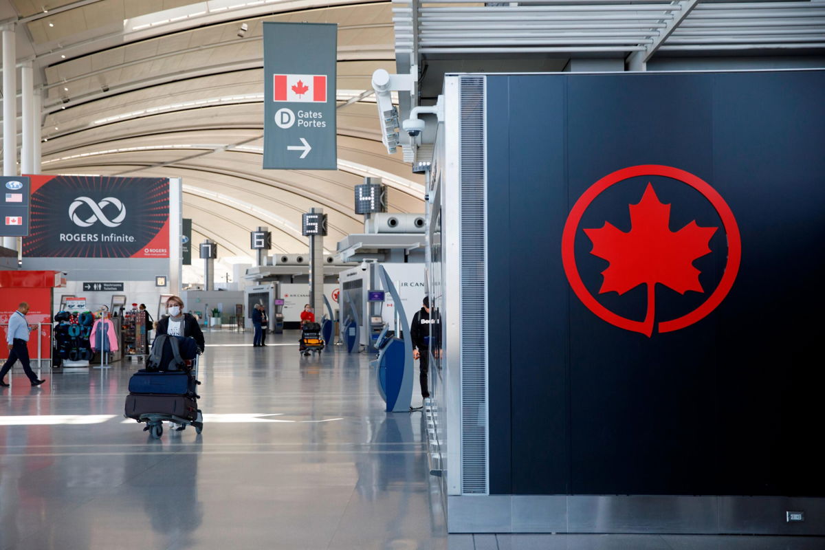 <i>Cole Burston/Getty Images</i><br/>Canada announced it will lift its Covid-19 pre-entry test requirement for fully vaccinated travelers beginning April 1.