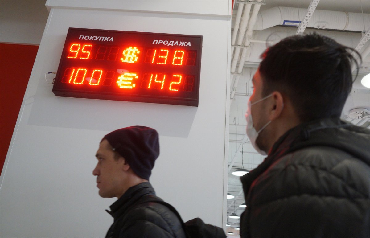 <i>Konstantin Zavrazhin/Getty Images</i><br/>The currency exchange rates of the U.S. Dollar and Euro to the Russian Ruble are displayed outside a bank in Moscow