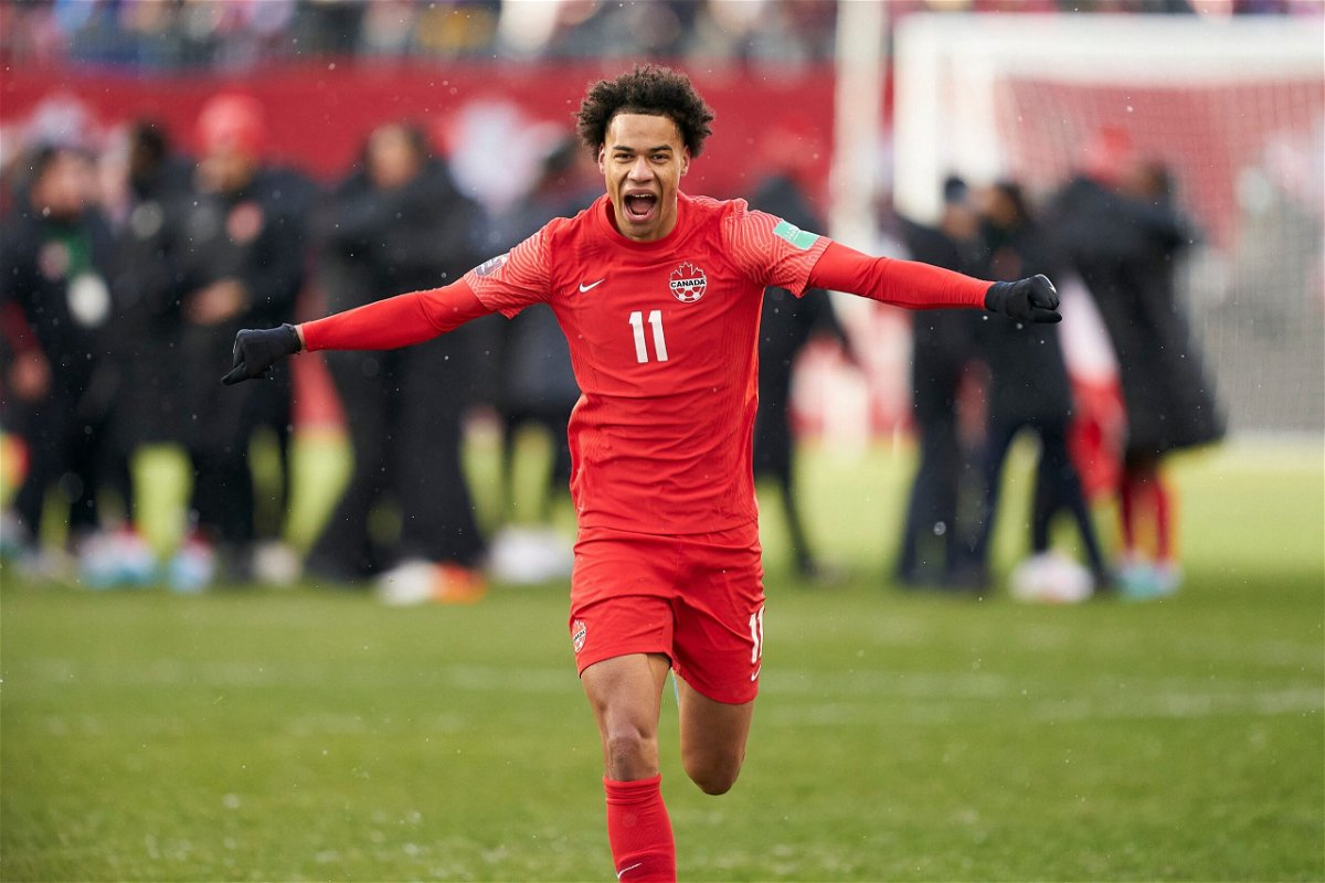 <i>Geoff Robins/AFP via Getty Images</i><br/>Tajon Buchanan celebrates after Canada defeated Jamaica 4-0 in its World Cup qualifier to secure a place in Qatar.