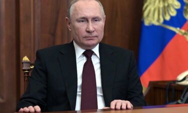 Russian President Vladimir Putin speaks during his address to the nation at the Kremlin in Moscow on February 21.
