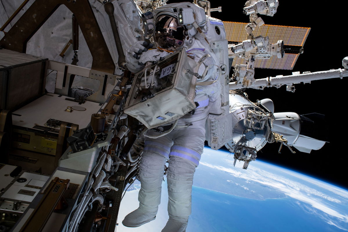 <i>NASA</i><br/>NASA astronaut Raja Chari is pictured tethered to the International Space Station during a six-hour and 54-minute spacewalk on March 15.