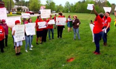 About two dozen employees of a Weaverville Wendy’s protested Friday