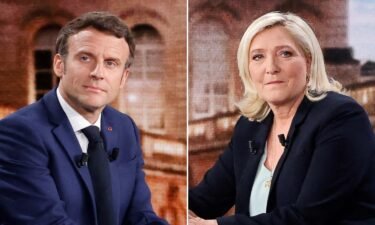 French President and La Republique en Marche (LREM) party candidate for re-election Emmanuel Macron (L) and   French far-right party Rassemblement National (RN) presidential candidate Marine Le Pen (R) pose prior to taking part in a live televised debate on French TV.