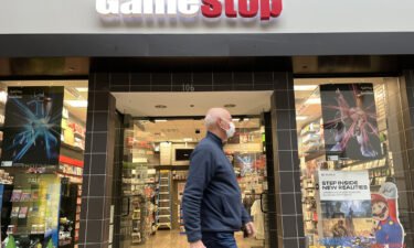 GameStop wants to make shares more affordable for meme stock lovers. A mall visitor is seen walking by a GameStop store in December 2021 in San Rafael