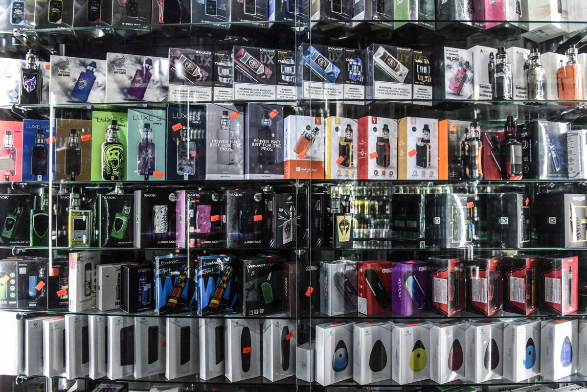 <i>Stephanie Keith/Getty Images</i><br/>Vaping and e-cigarette products are displayed in a store in New York City in December 2019. The FDA closed a loophole that vaping companies have used to circumvent regulators and keep their products on shelves.
