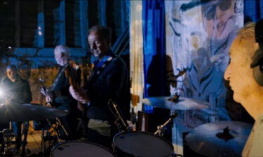 Pink Floyd performs "Hey Hey Rise Up" in this screengrab taken from the music video for the song.