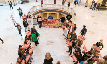 Anti-abortion activists stand outside the Oklahoma House chamber in Oklahoma City where Gov. Kevin Stitt delivers his State of the State address on February 7.