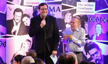 Bob Saget (L) and Gilbert Gottfried speak onstage during the Scleroderma Research Foundation's 30th Anniversary Cool Comedy - Hot Cuisine at Caroline's Comedy Club on December 5