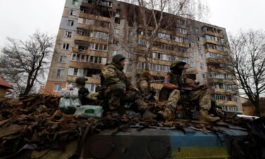 Ukrainian soldiers are pictured in Bucha on April 2