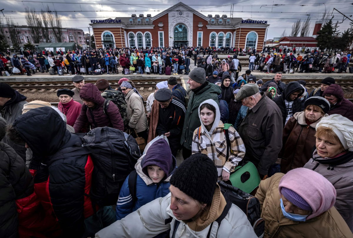 <i>Fadel Senna/AFP/Getty Images</i><br/>Families walk on a platform to board a train at Kramatorsk central station as they flee the eastern city on April 5.