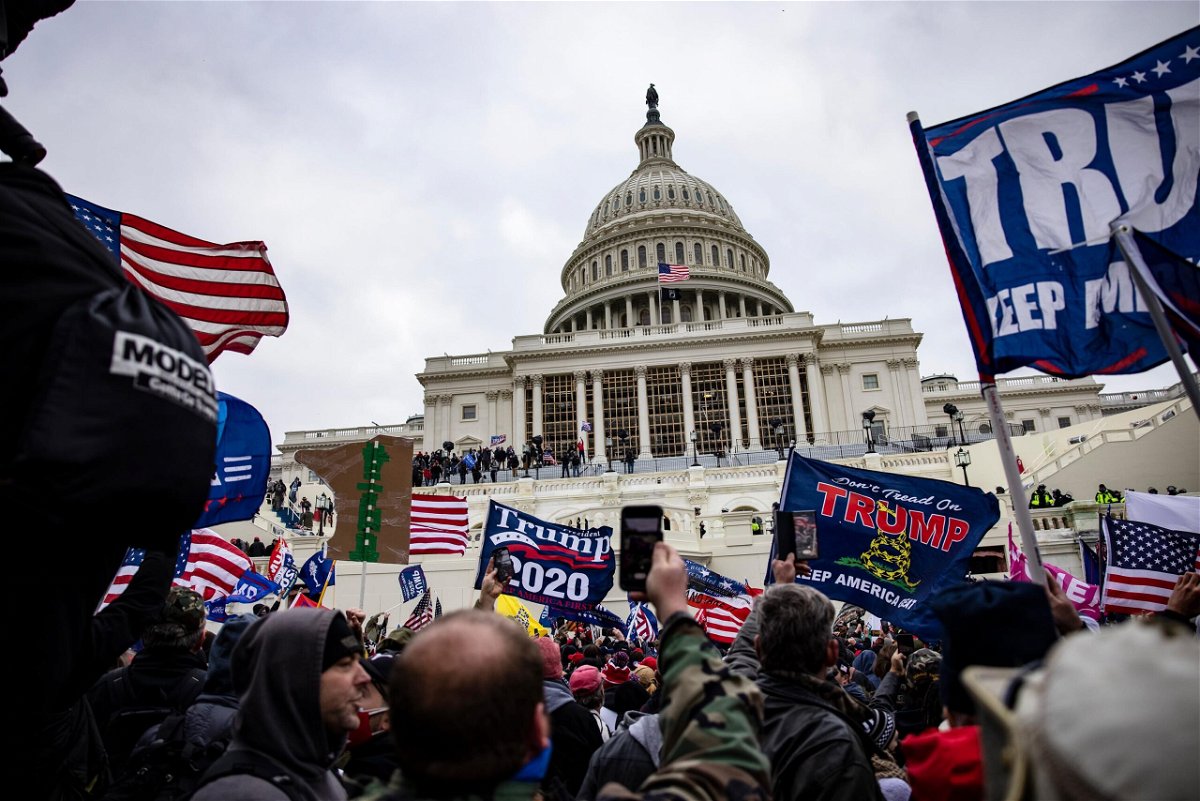 <i>Samuel Corum/Getty Images</i><br/>Pro-Trump supporters storm the U.S. Capitol following a rally with President Donald Trump on January 6